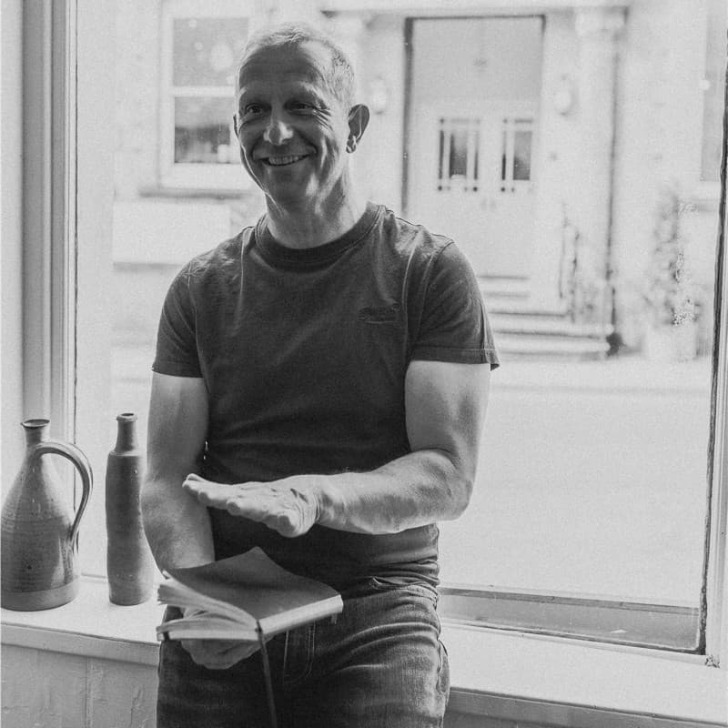 An avatar photograph of Andrew Krisson